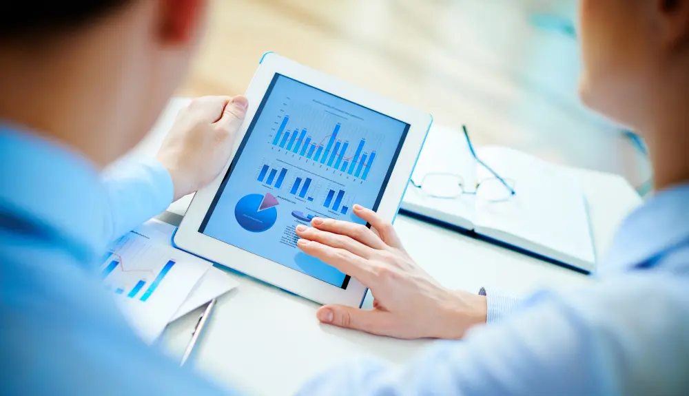 People reviewing performance analytics dashboard